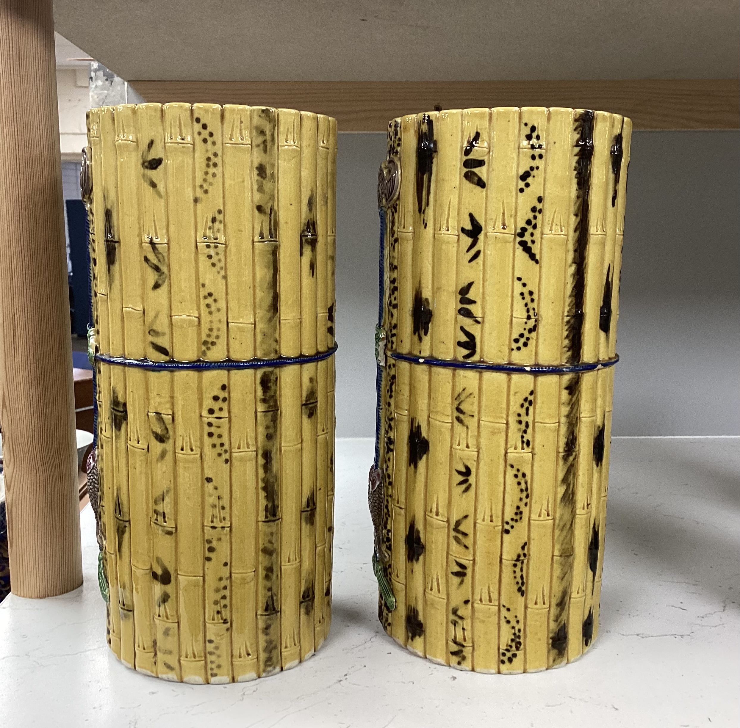 A pair of Chinese polychrome glazed faux bamboo vases, 19th century, 27cm high